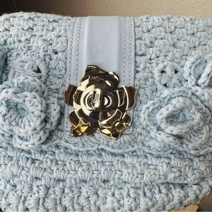 Ted Baker Sky Blue Crochet Clutch with Gold Floral Detail